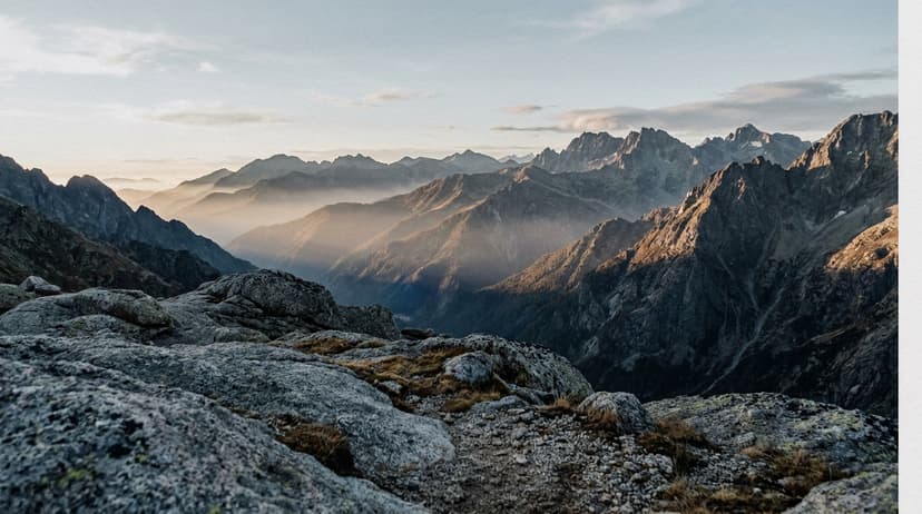A wide vista sharp from the foreground rocks all the way to distant peaks, shot stopped down for full depth of field