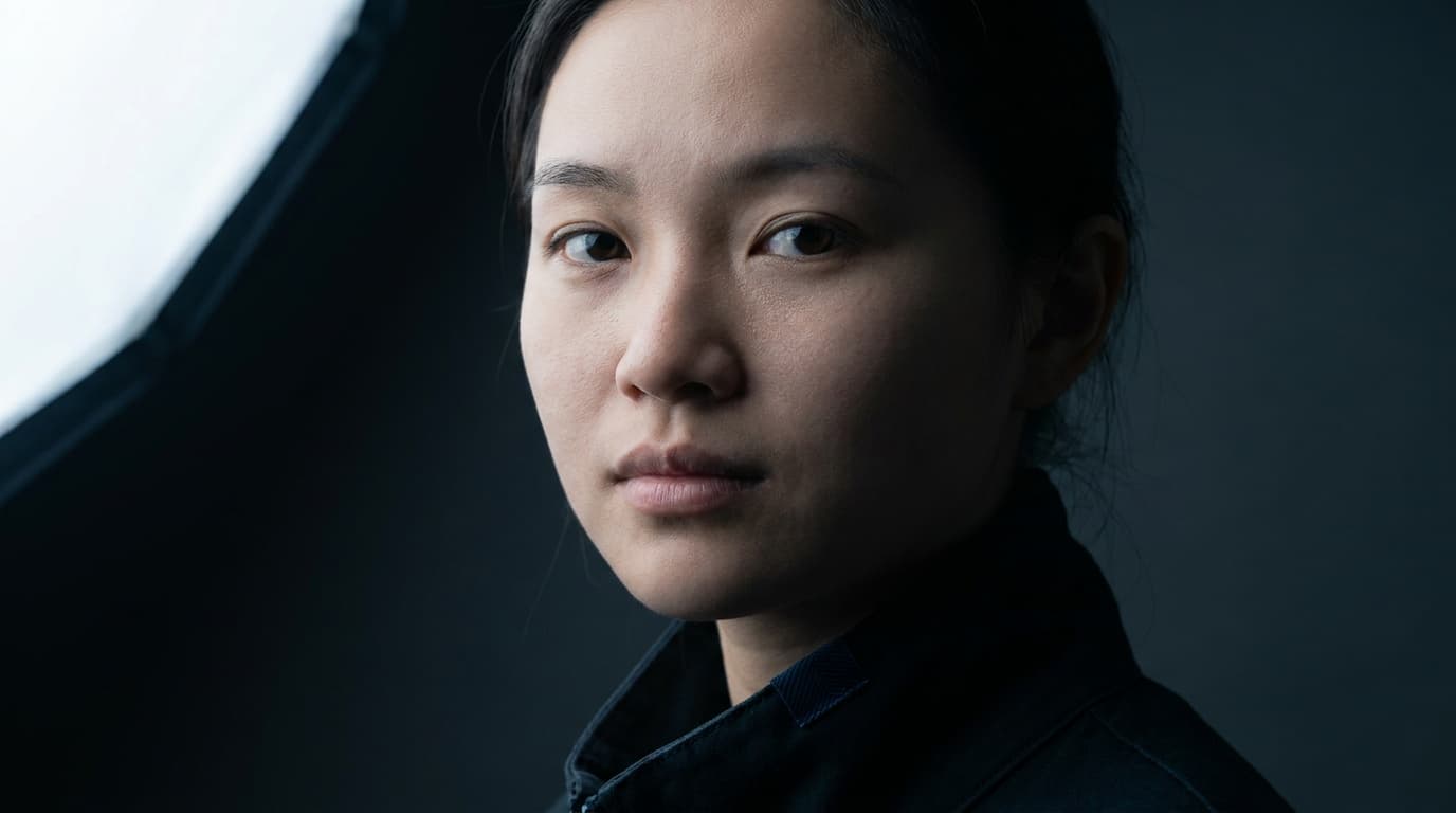 A portrait shaped by a single off-camera light from the side